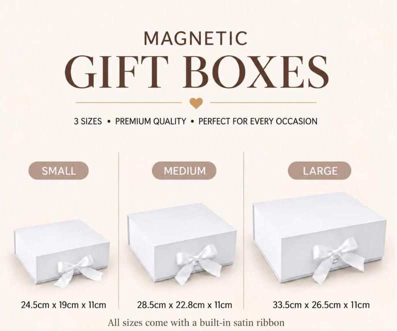 May include: Three white rectangular magnetic gift boxes with satin ribbon bows. Small box: 24.5cm x 19cm x 11cm. Medium box: 28.5cm x 22.8cm x 11cm. Large box: 33.5cm x 26.5cm x 11cm. Text reads: MAGNETIC GIFT BOXES, 3 SIZES, PREMIUM QUALITY.