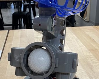 Switch-adapted ball pitcher