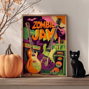 Könnte beinhalten: Ein gerahmtes Halloween-Poster mit den Worten "ZOMBIE JAM" in Orange und Grün. Zwei E-Gitarren sind abgebildet, eine orange und eine grüne, mit einem lila und grünen Hintergrund. Eine schwarze Katze und ein Kürbis befinden sich im Vordergrund.