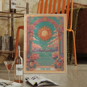 Framed The Sun tarot illustration as a vintage tarot poster, radiant mystical tarot wall art in art nouveau celestial style.