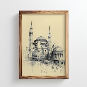 May include: Framed black and white sketch of a grand building with multiple domes and minarets, likely a mosque or cathedral. The artwork is set against a cream-colored background and enclosed in a wooden frame.