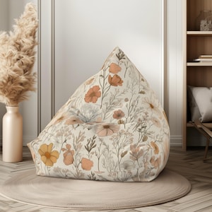 Pastel bean bag chair cover for kids room, soft nursery decor in light beige, soft pink and light blue, made from 100% polyester with secure lock and key zipper, inner sewn-in case for filling, available in two sizes, ships without filling, perfect gift.
