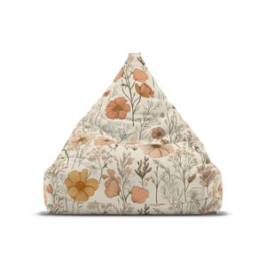 Soft pastel bean bag chair cover for children, featuring minimalistic Scandinavian design, 100% polyester fabric, lock and key zipper, inner sewn-in case, available in small and large sizes, ships without filling, perfect for nurseries and playrooms.
