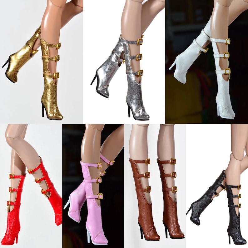 May include: A collection of high-heeled boots in various colors, including gold, silver, white, red, pink, brown, and black. Each boot features multiple straps with gold-colored buckles and a pointed toe.