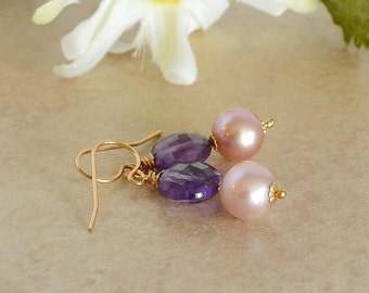 Amethyst and Pearls.  Pink and Purple gems for February and June Birthdays