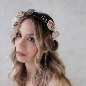 a bridal crown with dried looking roses