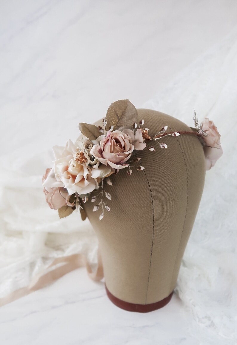 Close up of bridal rose crown on millinery head