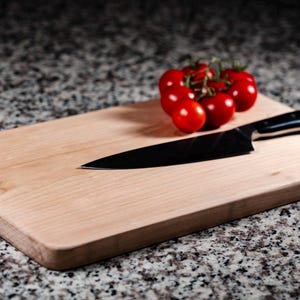 Solid, one piece, all natural, cherry wood cutting board. No glue, no chemicals, no oils. The healthiest cutting board you can own.