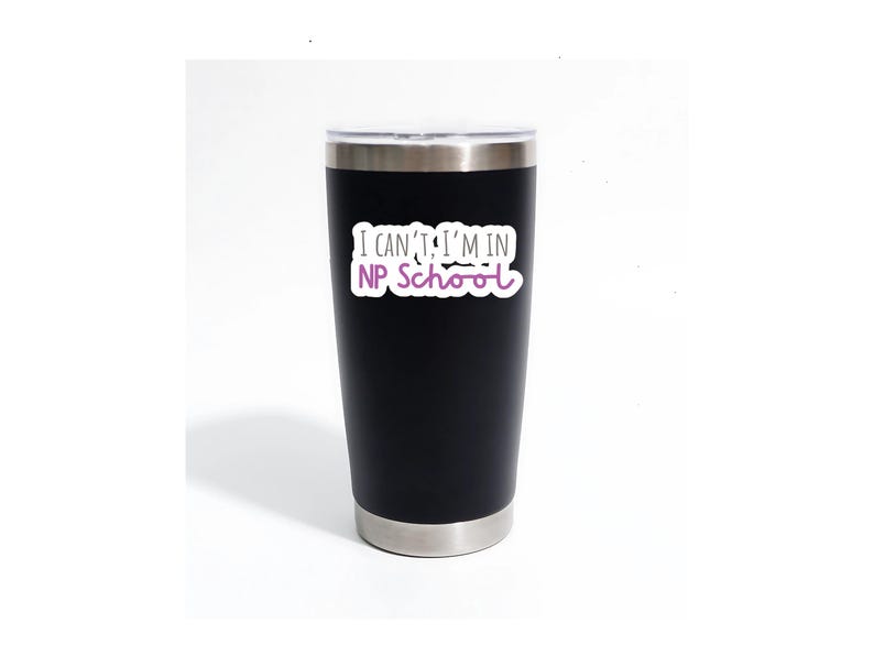 May include: A black stainless steel tumbler with a white sticker that says "I can't, I'm in NP School" in black and purple text.