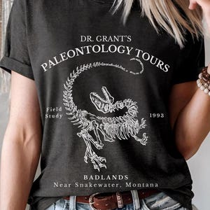 Grant’s Paleontology Tours Dark Unisex T-Shirt - Dinosaur Lover Gift, Paleontology Shirt, Vintage Jurassic Shirt, 90s Movies, Subtle Merch
