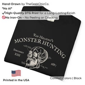 May include: Black t-shirt featuring a detailed skull graphic with the text "Van Helsing's Monster Hunting" and "Specimen XIII 1887." The shirt is hand-drawn and printed in the USA with a high-quality DTG print for a long-lasting finish.