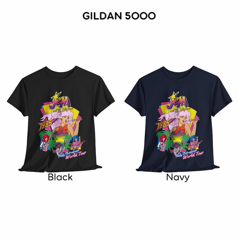May include: Two Gildan 5000 t-shirts in black and navy, each featuring a graphic print of Jem and the Holograms with the text 1985 and Truly Outrageous World Tour. The design includes a central female figure with pink hair, a yellow star, and band members.