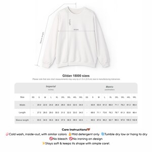 May include: White Gildan 18000 sweatshirt with size chart and care instructions. The chart shows measurements in inches and centimeters. Care instructions include cold wash, mild detergent, and tumble dry.