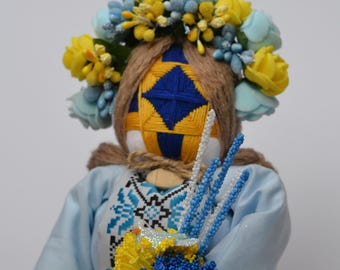 Muñeca ucraniana Motanka hecha a mano con paloma de la paz