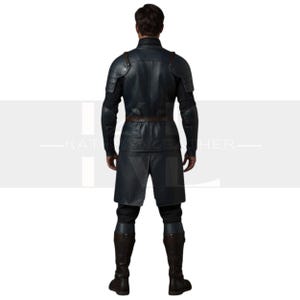 May include: A dark blue leather costume with a high collar, shoulder pads, and a brown belt. The outfit includes a long-sleeved jacket, knee-length skirt, and tall boots. The back view of the costume is shown.