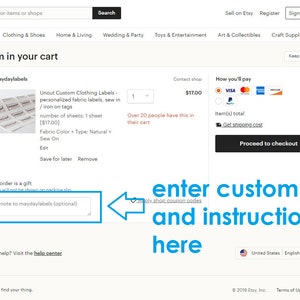 May include: A screenshot of an Etsy checkout page showing a single item in the cart for $17.00. The item is a sheet of un-cut custom clothing labels. The text "Add a note to maydaylabels (optional)" is displayed in a text box. The text "enter custom text and instructions here" is displayed in a blue box with an arrow pointing to the text box.
