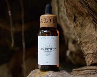 Puede incluir: Una botella de vidrio marrón con un gotero y una etiqueta blanca. La etiqueta dice "Salisa Herbals Goldenrod Tincture 30 ml".