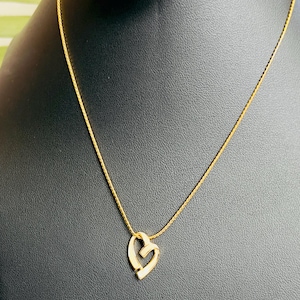 Vintage Signed Monet Gold Toned Chain with Off-white/Cream Painted Enamel Heart Pendant.