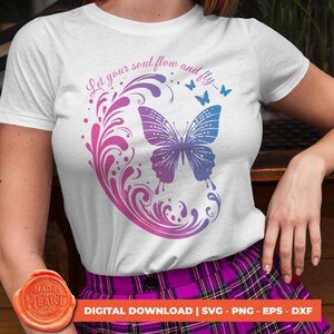 May include: White t-shirt featuring a butterfly design with a gradient of purple and blue. The design includes the text "Let your soul flow and fly..." and is surrounded by decorative swirls. The image also includes the text "DIGITAL DOWNLOAD | SVG - PNG - EPS - DXF".