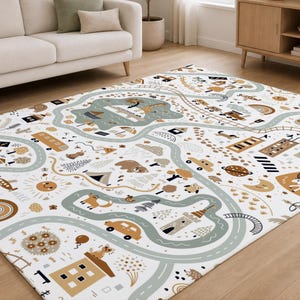 May include: A rectangular area rug featuring a white background with a repeating pattern of winding gray roads, brown buildings, green trees, various animals, vehicles, and celestial elements in muted earth tones of tan, sage green, and brown.