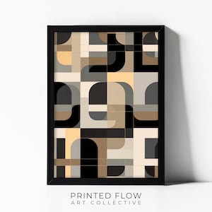 May include: A rectangular wall art print in a black frame featuring a grid of overlapping geometric shapes in shades of black, gray, beige, and tan. The text PRINTED FLOW ART COLLECTIVE is centered below the frame in a simple black sans-serif font.