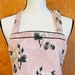 see more listings in the Floral Nature Aprons section