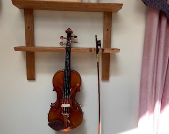 Kanso Violin Shelf. Japanese inspired book shelf with one violin/Viola slot and 2 bow hanging slots.