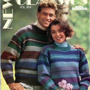May include: A couple wearing striped sweaters, the man is holding the woman's arm. The woman is holding a bouquet of pink flowers. The magazine cover reads "New Classics Vol. 854 Yarn Brunswick".