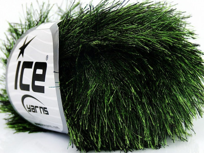 May include: A skein of green yarn with a shiny finish. The yarn is labeled "Ice Yarns".