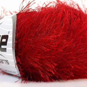 May include: A skein of red fuzzy yarn with the brand name "Ice Yarns" printed on the label.