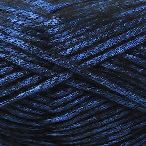 May include: A skein of dark blue metallic yarn with a subtle shimmer.