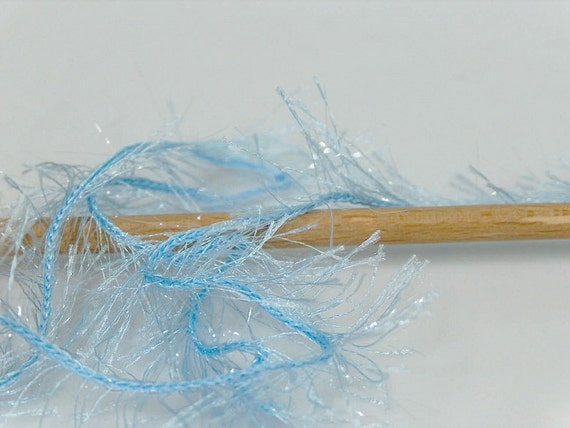 100 gram skein Baby Blue Eyelash Glitz #46562 Ice Sparkly Eyelash Yarn 153 yards 100 gram skein Baby Blue Eyelash Glitz #46562 Ice Sparkly Eyelash Yarn 153 yards