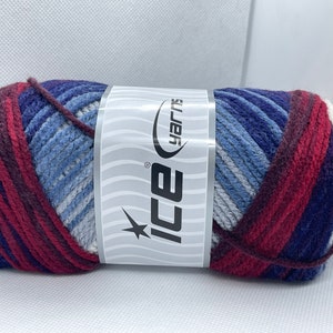 May include: A skein of yarn in a multi-colored striped pattern of red, blue, white, and gray. The yarn is labeled "Ice Yarns".