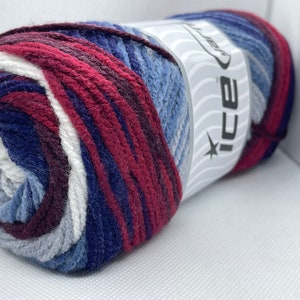 May include: A ball of yarn with a white, gray, blue, and burgundy color pattern. The yarn is labeled "ICE Yarn".