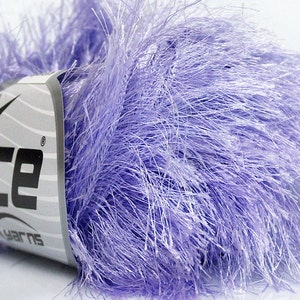 May include: A skein of light purple fuzzy yarn with a label that says "Ice Yarns" with a star logo.