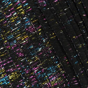 May include: Black fabric with a textured, woven pattern. The fabric has a metallic sheen with blue, pink, gold, and silver threads.