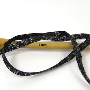 Namaste Glitz Ribbon Yarn 80354 Ice Yarns Black with Blue Pink Gold Silver Sparkle, Polyester 50 gr (1.76 oz) 57 m (62 yds) x 1/4 inch wide. image 3