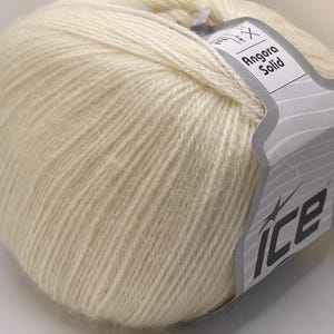 Ecru Angora Solid #77572 Ice Yarns Fine Weight Acrylic Angora Wool Blend Yarn - 3.53 ounces (100 grams) 601 yards (550 meters) Cream