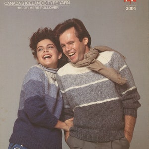 May include: Two people wearing striped jumpers, one with a scarf. The jumpers are made with Canada's Icelandic type yarn. The text "Elenka" and "2004" are visible in the image.