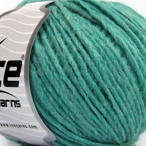 May include: A skein of teal blue yarn with a white label that says "Ice Yarns" and a website address.