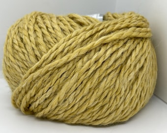 May include: A skein of yellow yarn with a slightly textured surface.