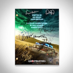 May include: A signed Ghostbusters: Afterlife movie poster featuring a green and blue background with a vintage car and the movie title. The poster is signed by several cast members, including Gil Kenan, Jason Reitman, Dan Aykroyd, and Harold Ramis.