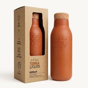 May include: A terracotta bottle with a cork stopper and the embossed text TERRA LIQUID. The bottle is presented next to a cardboard box featuring the same branding, a 600ml capacity label, and icons indicating natural terracotta and eco-friendly features.