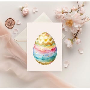 May include: A watercolor painting of a colorful Easter egg with gold accents. The egg is decorated with stripes, dots, and swirls.