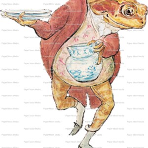 Peut inclure: Une illustration à l'aquarelle d'une grenouille portant une veste rouge et tenant un pichet bleu et blanc et une assiette. La grenouille est debout sur une seule patte et a une expression surprise sur son visage.