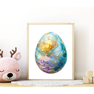 May include: A watercolor painting of a blue, purple, and gold Easter egg with a wavy pattern. The egg is on a white background.
