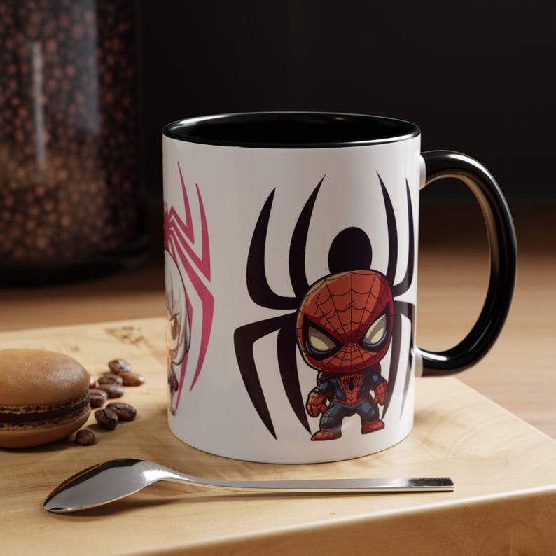 Team Spidey mug featuring Spider-Man and his fellow heroes from the Spider-Verse. The vibrant design showcases Spider-Man alongside other beloved characters, with bold, colorful graphics. Perfect for Marvel and Spider-Man fans