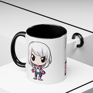 Ceramic mug featuring Spider-Gwen in her iconic white and pink suit, complete with web accents and dynamic design, perfect for Marvel fans and Spider-Verse enthusiasts.