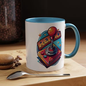 Retro Joystick Gaming Mug - Bring Arcade Vibes to Your Coffee Break!
