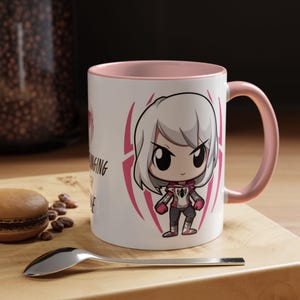 Spider-Gwen (Ghost-Spider) mug featuring a graphic of Spider-Gwen in her iconic white and pink suit. The design includes the phrase 'Web-Slinging with Style' in bold text, Perfect for Marvel fans and Spider-Gwen enthusiasts.